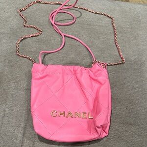 Pink Drawstring Crossbody Bag